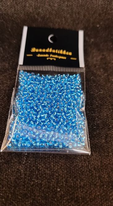 Hovedbilde 23B Lys blå transp. med shimmer